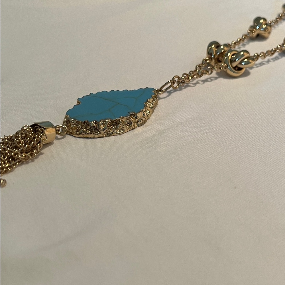 Elegant Gold Knotted Chain and Turquoise Colored Pendant with Tassel Necklace - Picture 7 of 9